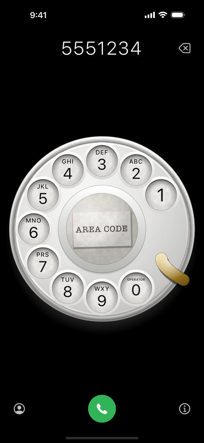The main screen: 5551234 dialed in thin white digits, the white dial on black, the green call button below